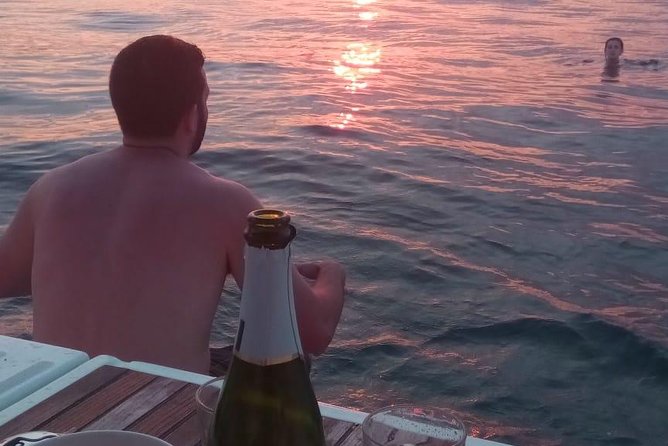 1h Refreshing Sailing Tour in Barcelona with Open Bar & Snacks - Drinks, snacks, and the value of $34.48