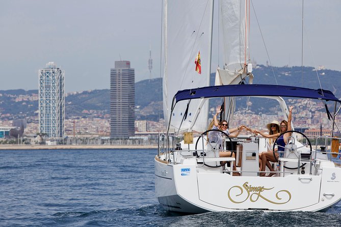 1h Refreshing Sailing Tour in Barcelona with Open Bar & Snacks - A small boat with a social, relaxed feel