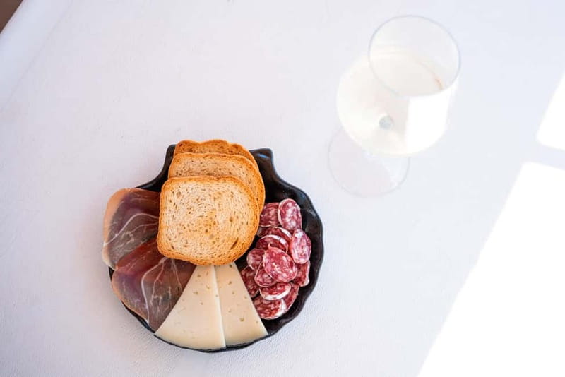 Barcelona: Catamaran Cruise w/ Sailing, Wine, & Tapa - Tapas, wine, and the ride back