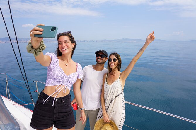 Barcelona Catamaran Cruise with Tapa & Drink Included - Crew, service, and the social mood