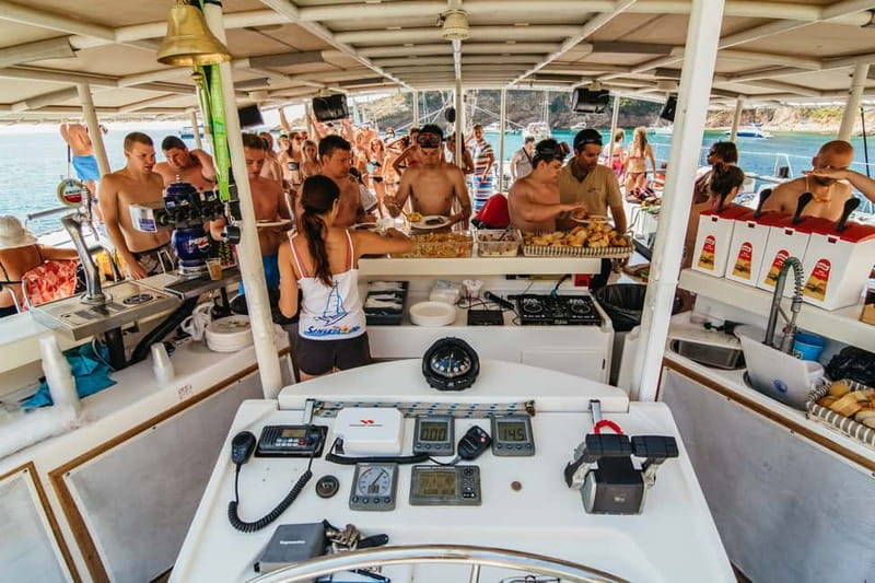 Barcelona: Catamaran Party Cruise with BBQ Meal - The Mediterranean swimming stop