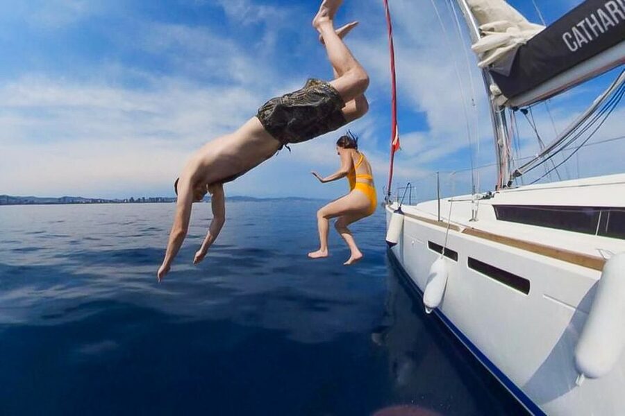 Barcelona: Coastline Boat Trip with Snacks and Cava - Snacks, cava, and the onboard drinks