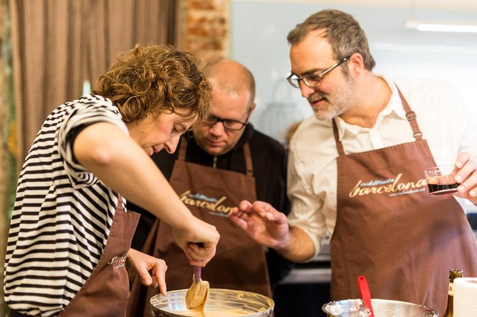 Barcelona Culinary Experience: Paella & Tapas Cooking Class - Making paella with a chef at your side