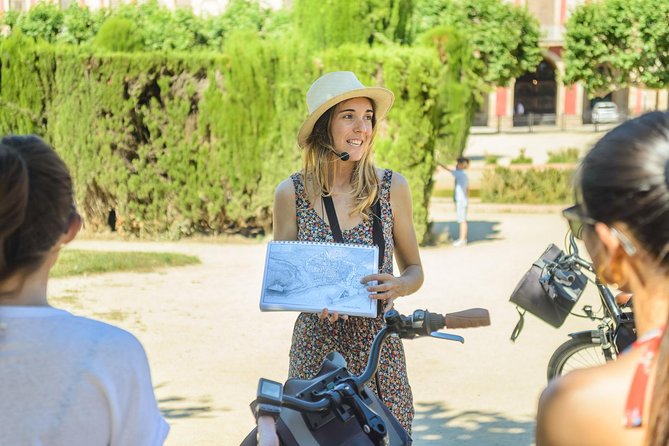 Barcelona E-Bike Small Group Tour with Tapas & Wine Tasting - Barceloneta: old fishing quarter, new beach culture