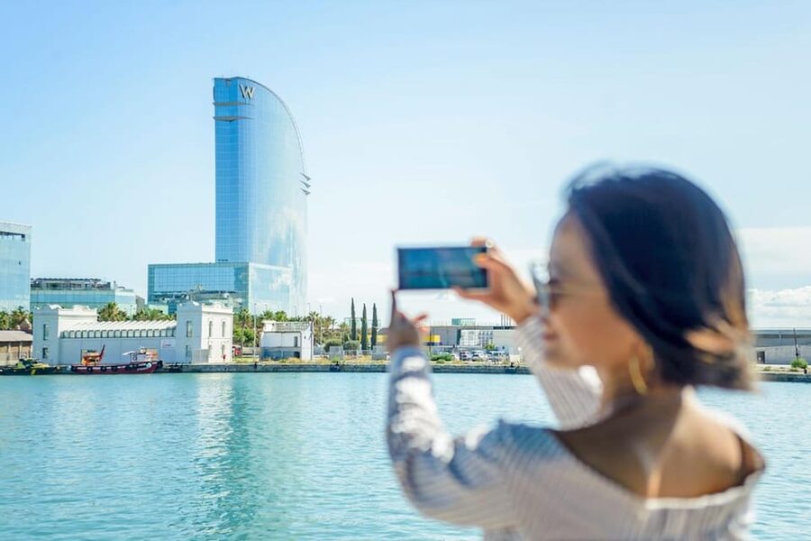 Barcelona: E-Bike Tour with Montjuic Cable Car & Boat Ride - Riding the funicular toward Montjuïc