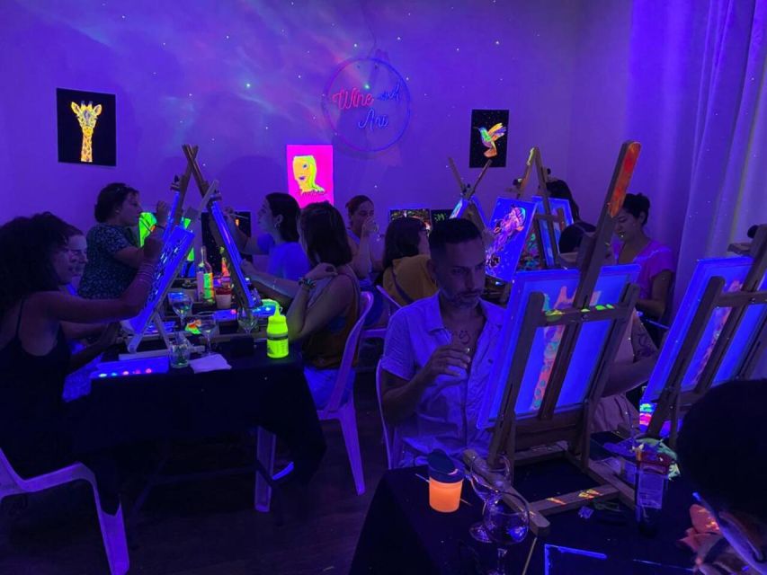 Barcelona: Fluorescent Paint and Wine Workshop - Following the guided design or painting your own idea