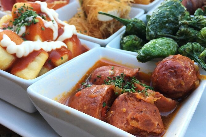 Barcelona Food Tour: Tapas, Drinks and Delights with a Local - Carrer del Regomir brings the classic tapas