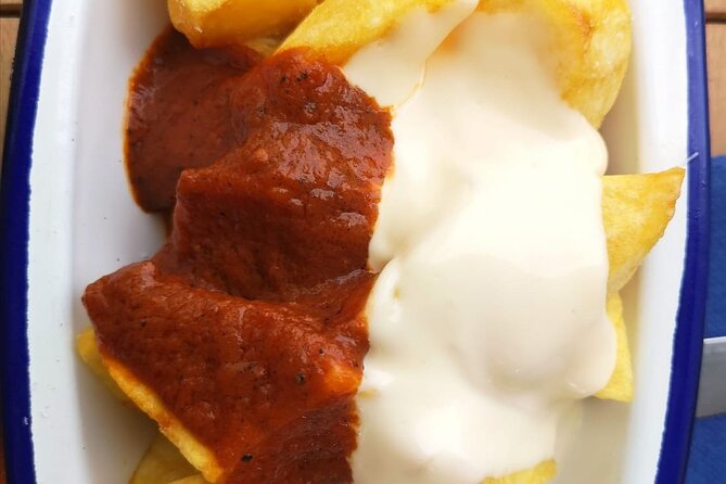 Barcelona Food Tour: Tapas, Drinks and Delights with a Local - Plaça de Sant Jaume and a Catalan finish
