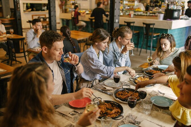 Barcelona: Guided Food Walking Tour with Tapas and Wine - Roman walls and the walk into El Born