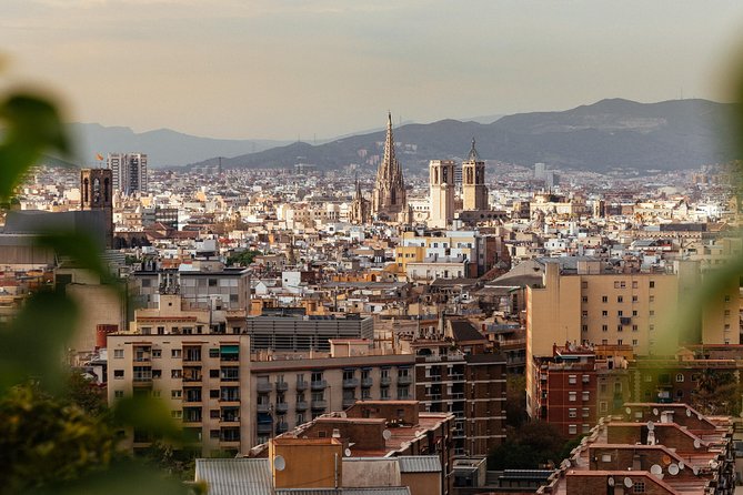 Barcelona Highlights & Hidden Gems Private Tour - Taking a break beneath the arcades of Plaça Reial