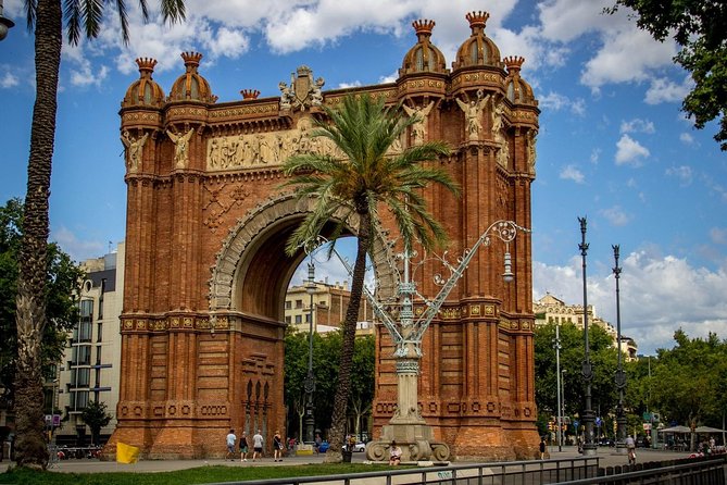 Barcelona Highlights Small Group Tour with Hotel Pick Up - Roman columns in a medieval courtyard