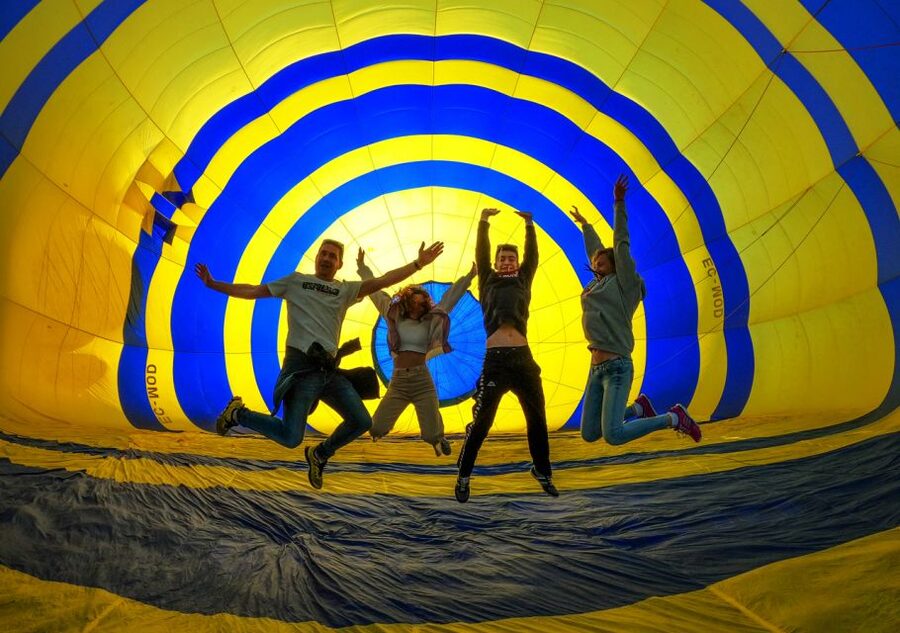 Barcelona: Hot Air Balloon Ride with Optional Transportation - Helping inflate the balloon before takeoff