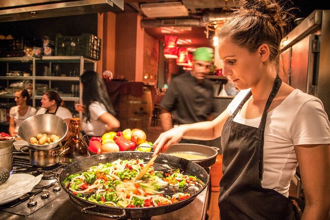 Barcelona Interactive Spanish Cooking Experience - Making seafood paella from the first step