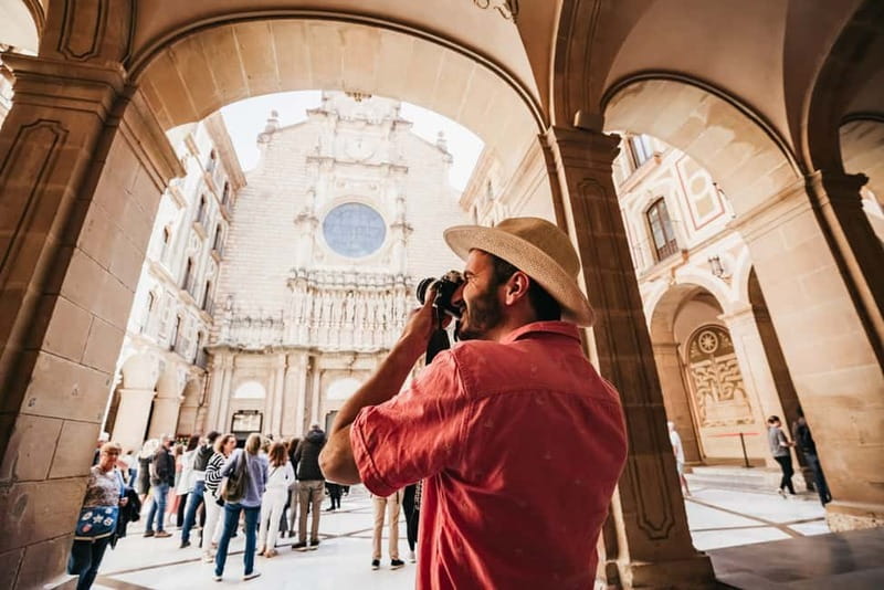 Barcelona: Montserrat and Winery Tour with Tapas or Lunch - Riding the cogwheel train into the mountains