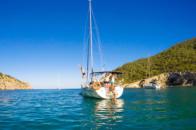 Barcelona Private Sailing Tour with Drinks for Family and Friends - The swim stop and inflatable water toys