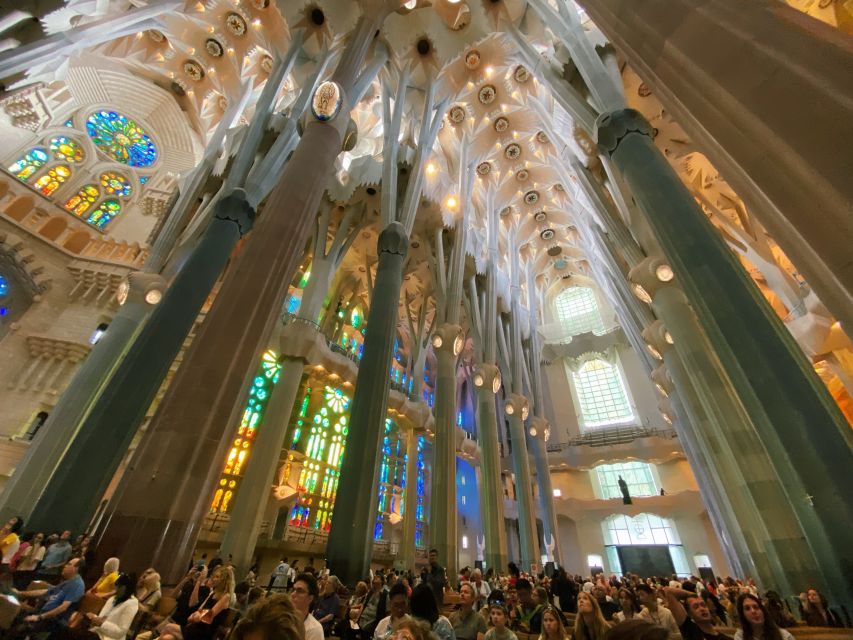 Barcelona: Sagrada Familia Skip-the-line Tour with Guide - Inside the basilica: columns, light, and scale