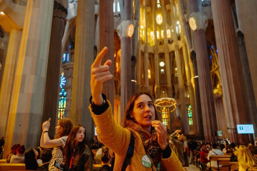 Barcelona: Sagrada Familia Tour w/Skip-the-Line Entry Ticket - Entering the basilica through the separate entrance