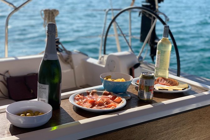 Barcelona Sailing: Light Snacks & Open Bar with Private Option - The swimming stop depends on sea and weather