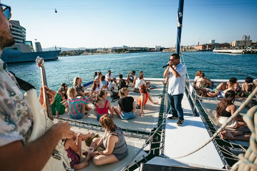 Barcelona: Sunset Catamaran Cruise with Live Music - Stretching out on the nets