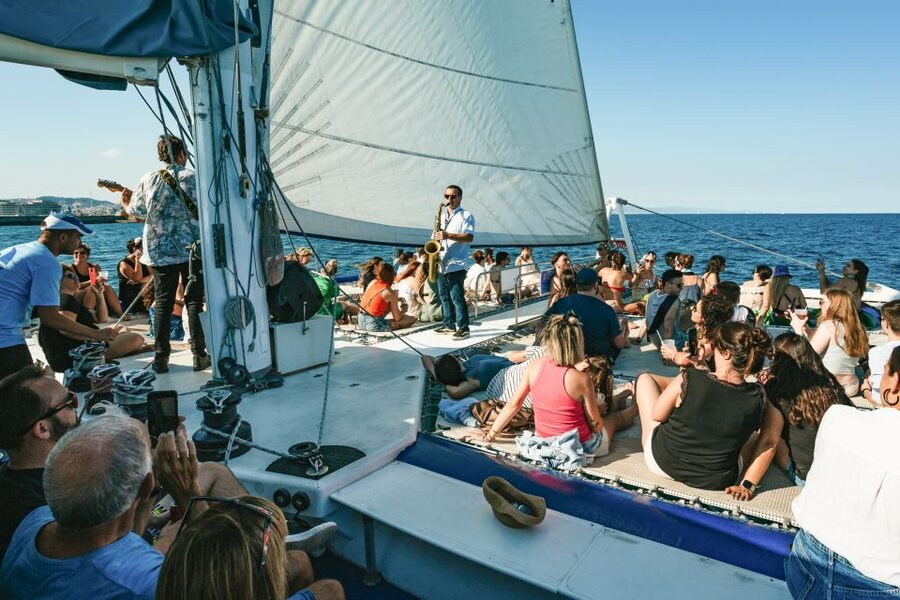 Barcelona: Sunset Catamaran Cruise with Live Music - Drinks at the onboard bar