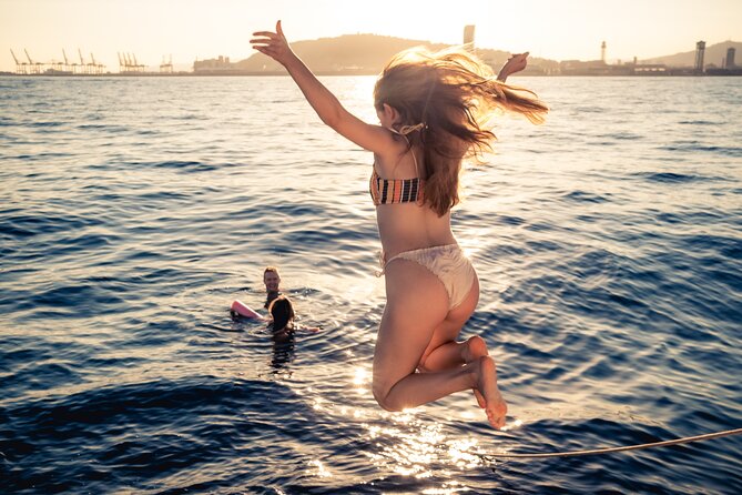 Barcelona Sunset Cruise with Light Snacks and Open Bar - What the crew adds to the evening