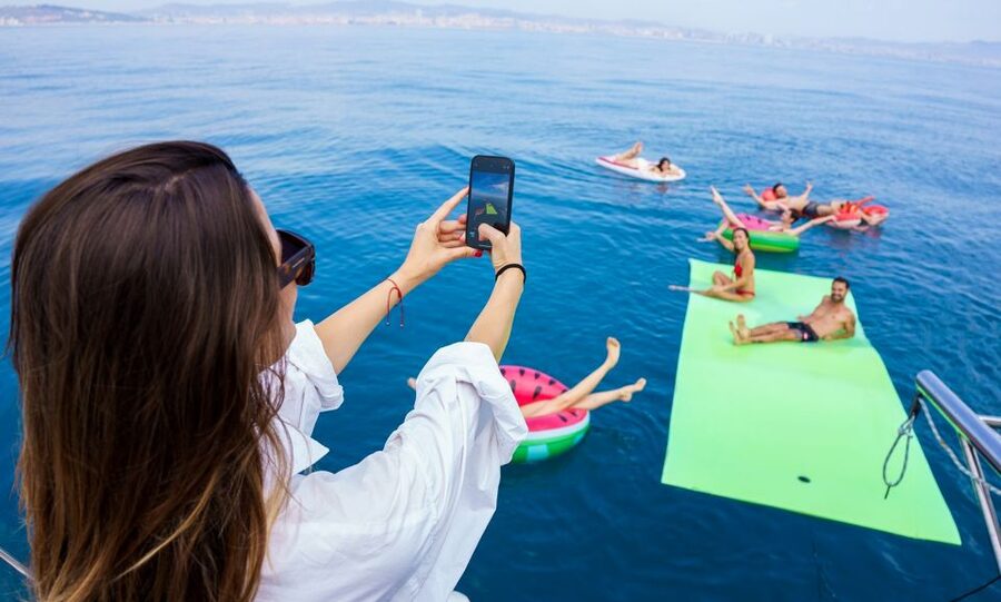 Barcelona: Sunset or Day Catamaran Cruise with Tapa & Drink - The daytime sailing and its 30-minute swim stop