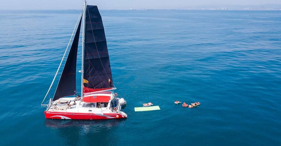 Barcelona: Sunset or Day Catamaran Cruise with Tapa & Drink - Finding your place on the 30-person catamaran