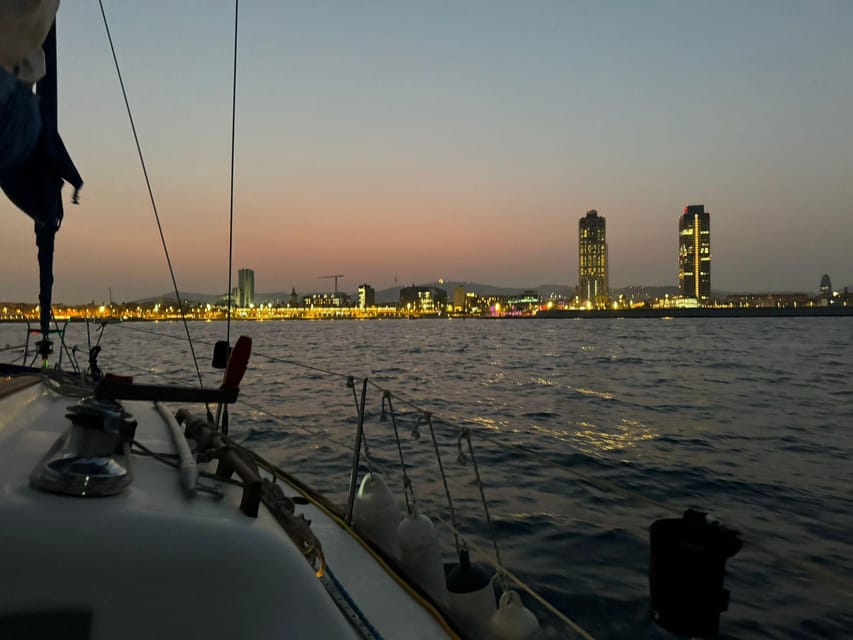Barcelona: Sunset Sailboat Cruise with Drinks and Snacks - What you see as the sun goes down