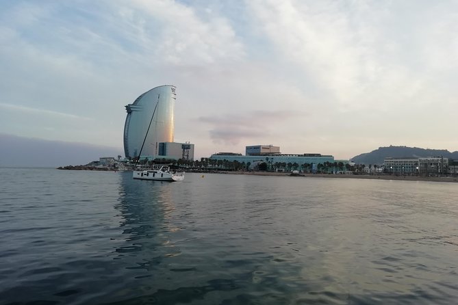 Barcelona Sunset Sailing Cruise from Port Olímpic with Open Bar - Drinks, snacks, and the open-bar reality