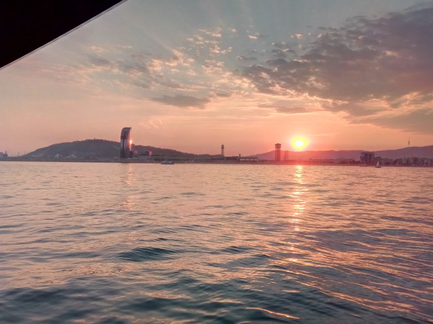 Barcelona: Sunset Sailing Tour with Open Bar & Snacks - Setting Out From Port Olímpic