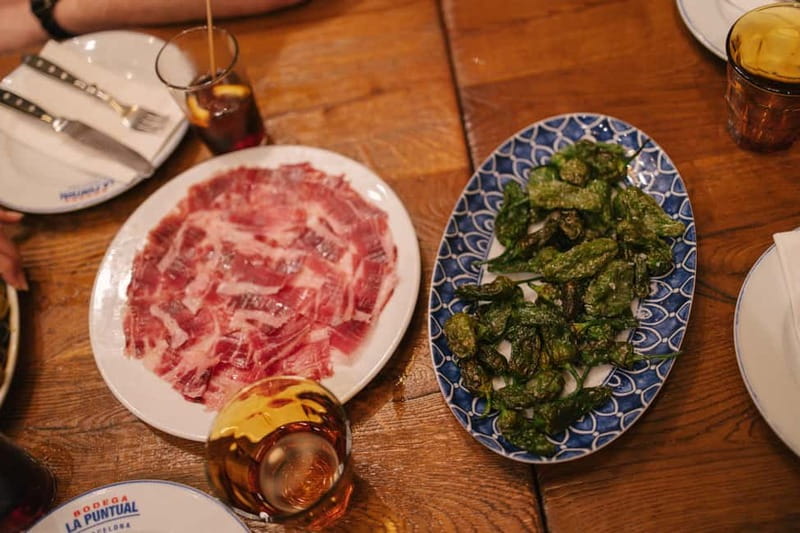 Barcelona: Tapas Food Crawl Walking Tour with Tastings - Walking toward the Gothic Quarter