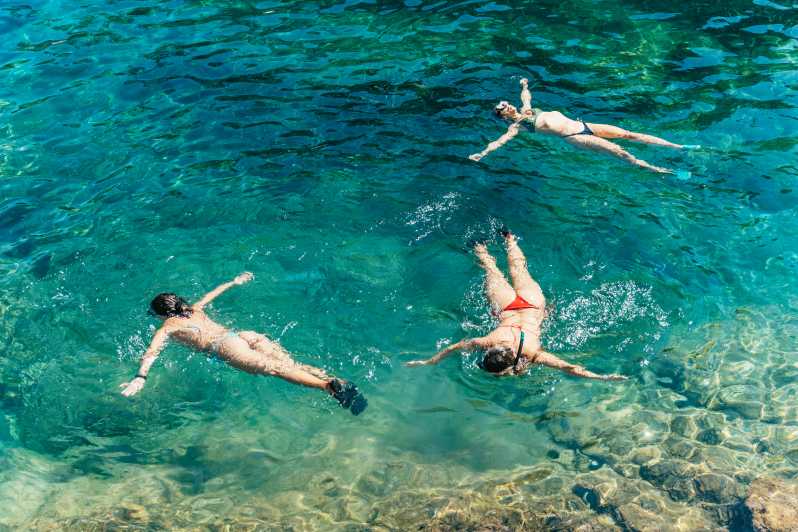 Barcelona: Tossa de Mar Kayak & Snorkel Tour w/3-Course Meal - Key points at a glance