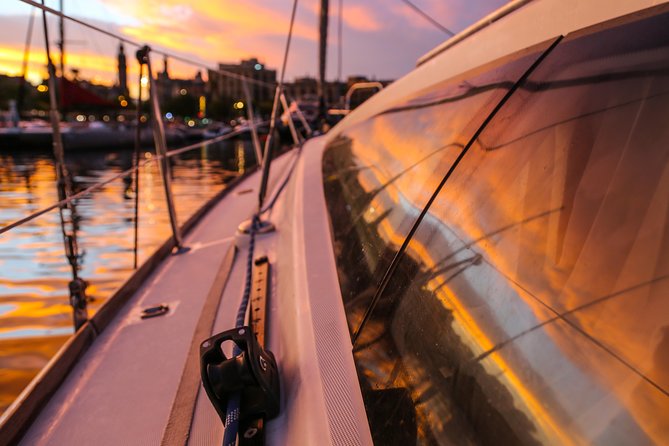 Barcelona Unique Sunset Sailing Experience with Tapas & Open Bar - Passing Platja de la Nova Icaria