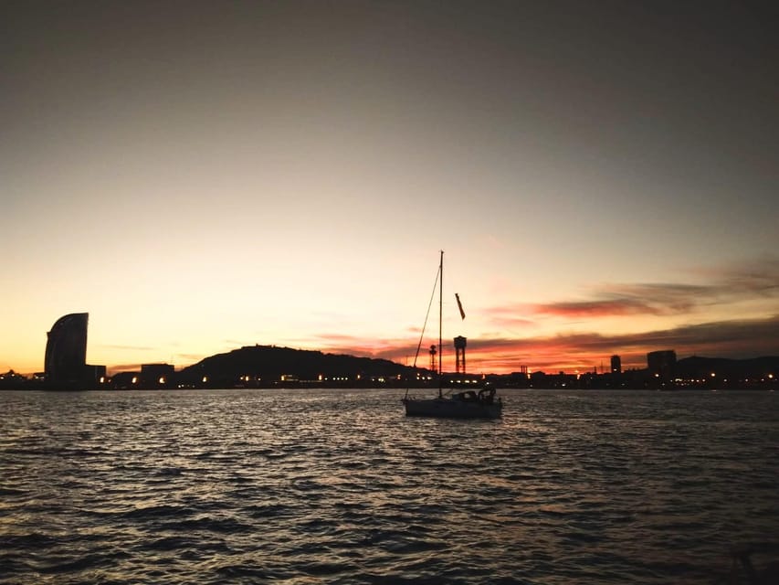Barcelona: Unique Sunset Sailing Tour with Tapas & Open Bar - Barcelona’s skyline from the sea