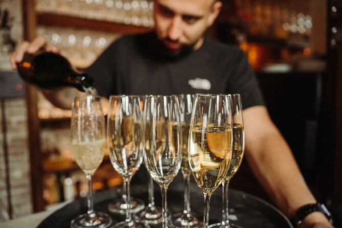 Bohemian Barcelona Neighborhood Evening Tapas & Wine Tour - First Stop: Santagustina and a Glass of Cava