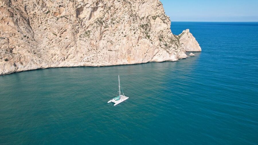 Calpe: Catamaran Tour with Optional Swim Stop - Leaving Calpe port and settling into the ride