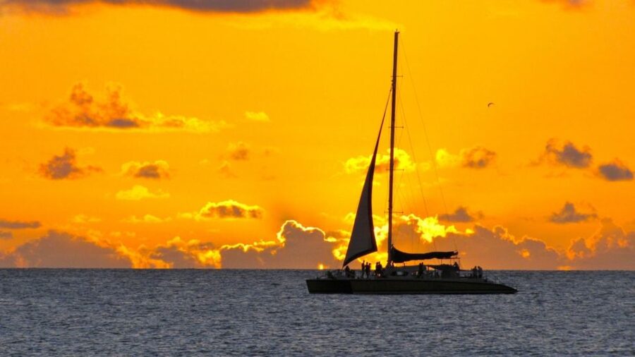 Cambrils: Costa Dorada Sunset Catamaran Cruise with Drinks - Leaving Cambrils as the afternoon cools