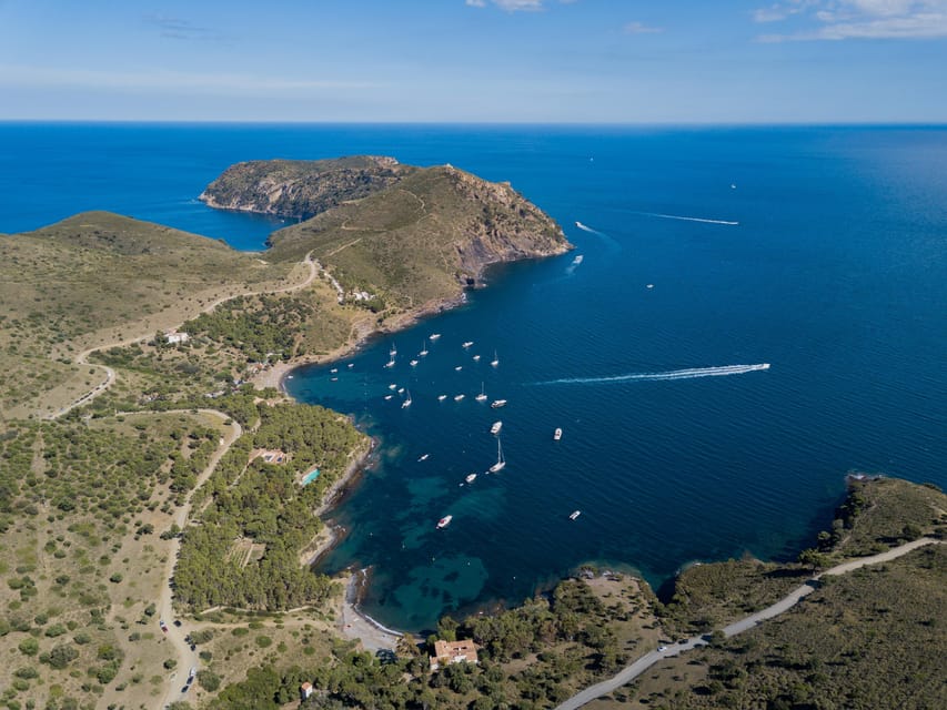 Cap Norfeu: Costa Brava Catamaran Trip with Underwater Views - The onboard welcome and audio guide