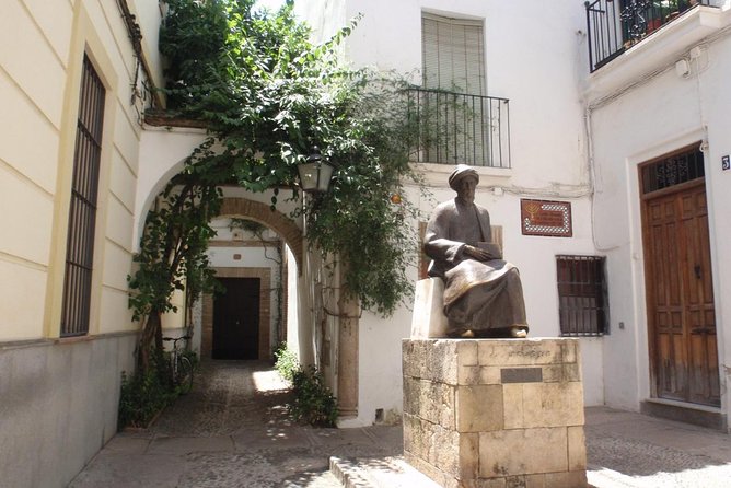 Cordoba Monuments Intensive Tour in English Tickets included - Entering the Mosque-Cathedral