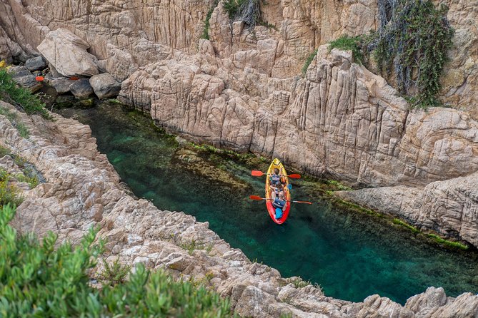 Costa Brava Kayak & Snorkel Tour + Picnic from Barcelona - Paddling along the rocky Costa Brava