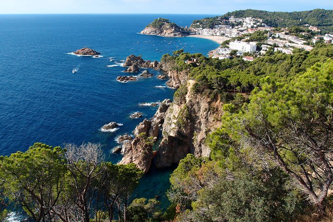 Costa Brava Small Group with Hotel Pick up and Boat Ride - Lloret de Mar and the boat along the coast