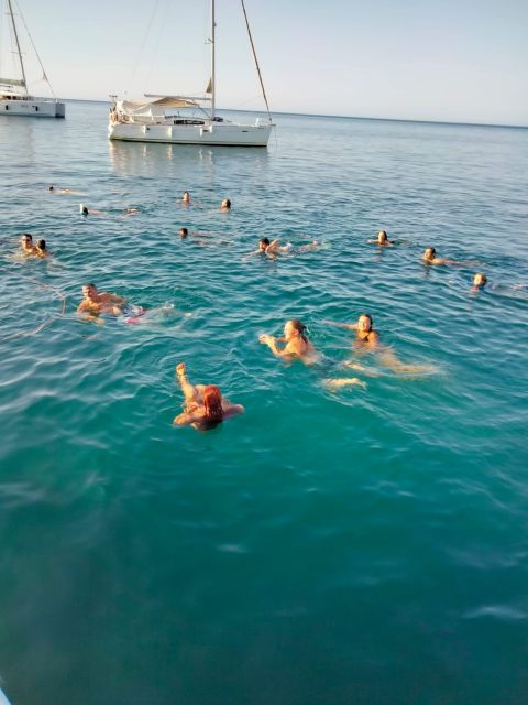 Denia: Cova Tallada Catamaran Tour and Swimming Stop - Along Las Rotas Toward Javea