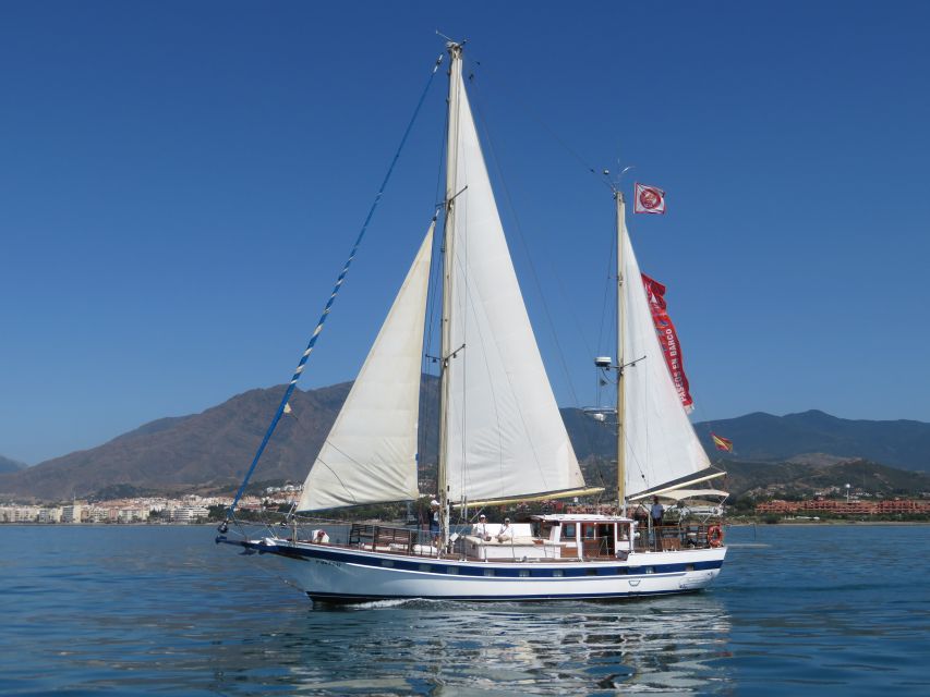 Estepona: Dolphin Watching Sailboat Cruise with Drink - Sailing out across Estepona Bay