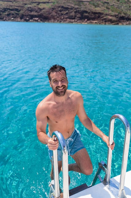Fornells: 3-Hour Boat Tour Along Menorcan Coast - Two swim stops with masks and paddleboards