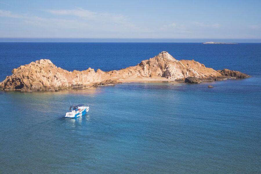 Fornells: 3-Hour Boat Tour Along Menorcan Coast - Boarding in Fornells and settling on the boat