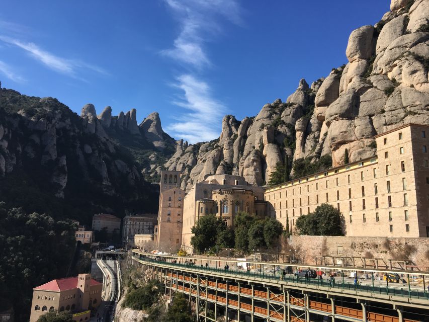 From Barcelona: Montserrat Monastery & Scenic Mountain Hike - Inside the 11th-century Benedictine monastery