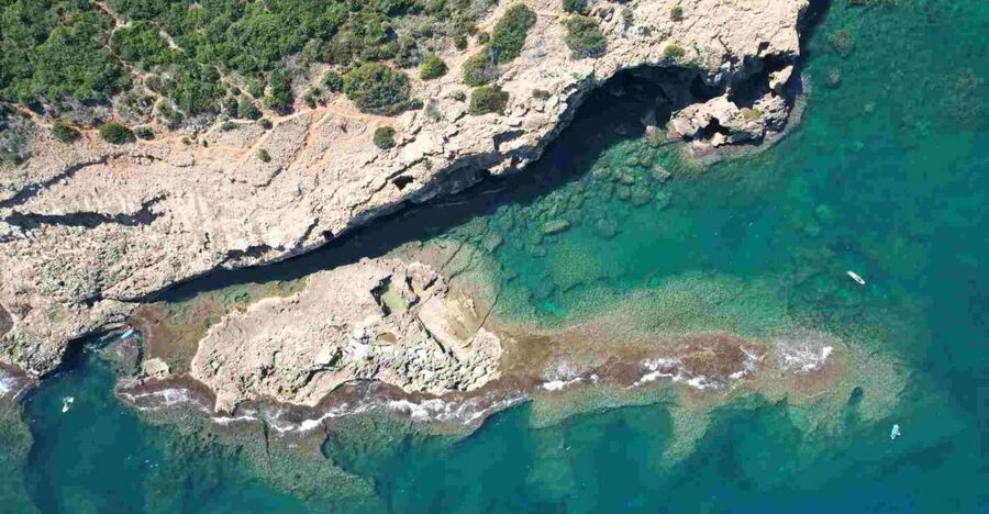 From Denia: Boat Trip to Tallada Cave with Optional Swim - Approaching Cova Tallada from the sea