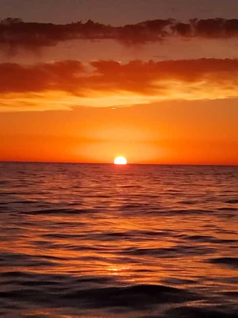 From Denia: Catamaran Trip with Sunset Option - A drink, music, and an easy pace