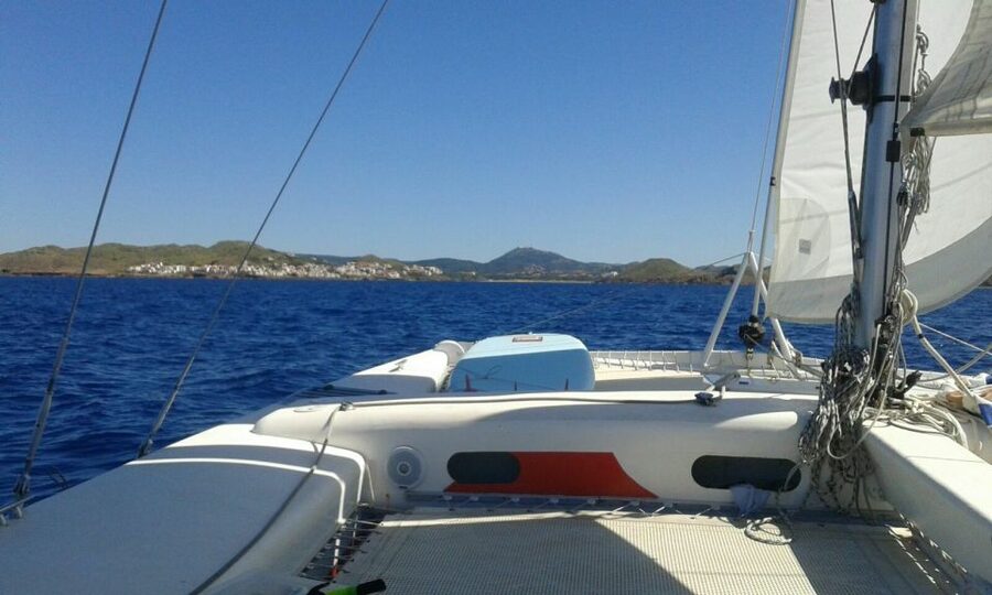 From Fornells: Half-Day Menorca Catamaran Trip w/ Snorkeling - Sailing quietly from Fornells