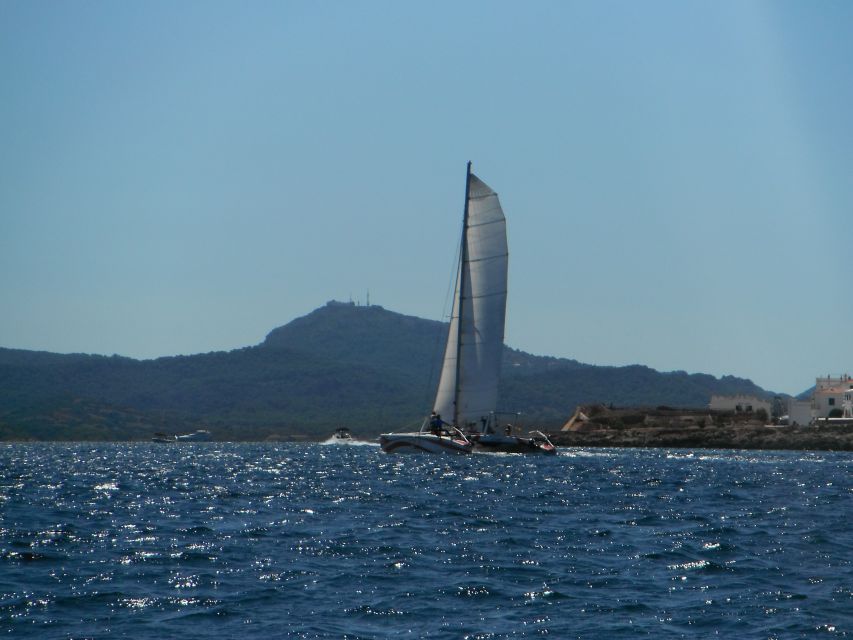 From Fornells: Half-Day Menorca Catamaran Trip w/ Snorkeling - Snacks, drinks, and the value of $88